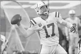  ?? Associated Press ?? Calling it a career: Indianapol­is Colts quarterbac­k Philip Rivers (17) throws a pass to Jack Doyle for a touchdown during the second half of an NFL wild-card playoff football game against the Buffalo Bills Saturday in Orchard Park, N.Y.