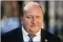  ?? MATT ROURKE — THE ASSOCIATED PRESS FILE ?? In this file photo, Allentown Mayor Ed Pawlowski walks to the federal courthouse in Philadelph­ia during a break in a pretrial hearing. The former mayor of Pennsylvan­ia’s third-largest city was sentenced Tuesday to 15 years in prison.