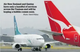  ?? Photo / Brett Phibss ?? Air New Zealand and Qantas have only a handful of services across the Tasman and will be hoping a bubble comes soon.