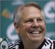  ?? CHARLES KRUPA — THE ASSOCIATED PRESS ?? Danny Ainge, Boston Celtics president of basketball operations, smiles as he addresses reporters at the team’s training facility in Waltham, Mass., Tuesday. The Celtics won the NBA draft lottery, capitalizi­ng on a trade they made with the Brooklyn Nets...