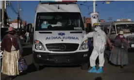  ??  ?? An ambulance at a hospital in El Alto, Bolivia. An ambulance medic was among three health workers to be infected by a patient in neighbouri­ng La Paz. Photograph: Juan Karita/