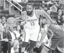  ?? TROY TAORMINA, USA TODAY SPORTS ?? With James Harden, above, moving to point guard and Ryan Anderson and Eric Gordon joining, the Rockets have soared.