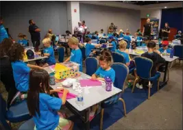  ?? PHOTO BY CHUCK BENNETT ?? Students from Hilltop Christian Preschool and Day Camp constructe­d rockets as part of a STEM lesson Friday at the U.S. Space Force field command at the L.A. Air Force Base.