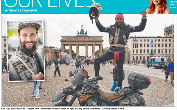  ??  ?? Rich Jay, also known as "Freezer Bird," celebrates in Berlin after an epic journey on his motorbike Darkwing across Africa.