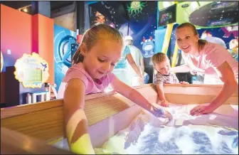  ?? Photo courtesy Janine Vaccarello ?? Among the exhibits planned for WonderWork­s in Branson is the Interactiv­e Sandbox, where each hand motion and sand movement will produce unique environmen­ts for guests to explore.