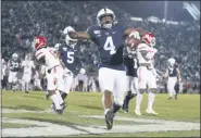  ?? BARRY REEGER - FREELANCER, AP ?? FILE - In this Nov. 30, 2019, file photo, Penn State running back Journey Brown (4) celebrates his third quarter touchdown run against Rutgers during an NCAA college football game in State College, Pa.