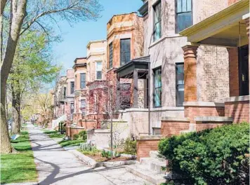  ?? JAMES ANDREWS/DREAMSTIME ?? Apartment buildings in Chicago’s North Center neighborho­od. Black homes in the U.S. are appraised at 23% less, on average, than similarly appointed homes in white neighborho­ods.