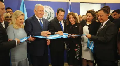  ?? (Marc Israel Sellem/The Jerusalem Post) ?? PRIME MINISTER Benjamin Netanyahu and his wife, Sara, and Guatemalan President Jimmy Morales (center) and his wife, Patricia Marroquín, inaugurate the new embassy in the capital yesterday.