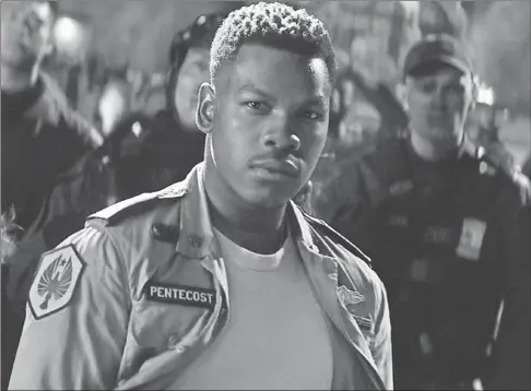  ??  ?? John Boyega en una escena de la película “Pacific Rim: Insurrecci­ón”, que se estrena este fin de semana en Estados Unidos, que ya esta disponible en las salas de cine de México