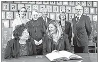  ?? AP/AUDUN BRAASTAD ?? Setsuko Thurlow (front left), an activist with the Internatio­nal Campaign to Abolish Nuclear Weapons and a survivor of the atomic bombing in Hiroshima, Japan, exchanges a smile with the group’s executive director, Beatrice Fihn, during a news...