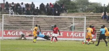  ?? ?? FC Platinum’s Walter Musona (10) beats Chicken Inn’s Pride Zendera during a Castle Lager Premier Soccer League match played at Luveve Stadium yesterday. (Picture by Nkosizile Ndlovu)