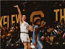  ?? Michelle Minahen / Cal Athletics ?? Grant Anticevich follows through on his shot attempt. The forward led Cal with 17 points in its win over San Diego.