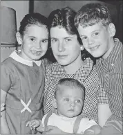  ?? FILE PHOTOS: THE ASSOCIATED PRESS ?? Shirley Ann Grau is shown in New Orleans in May 1965 with her children, Nora, 5, William, 6 months, and Ian, 8. Grau’s book, “The Keepers of the House,” drew praise but also threats because of the depiction of an interracia­l romance.