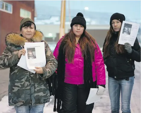  ?? NICK EAGLAND ?? Jody Leon, Meagan Louis and Sherriann Abraham stand outside the Upper Room Mission in Vernon, where on Friday they launched a flyer campaign in hopes of canvassing tips about the disappeara­nce and death of 18-year-old Traci Genereaux.