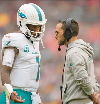  ?? ALEX BRANDON/AP ?? Dolphins coach Mike McDaniel and quarterbac­k Tua Tagovailoa are two reasons why the Dolphins are considered Super Bowl contenders, but are they near the top of the contender list?