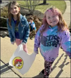  ?? Staff Photo/Brent Melton ?? Girl Scouts from Troop 2018 conducted a trash pick up operation to beautify Memorial Park and other areas on Sunday, Feb. 26.