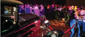  ??  ?? Awards dinner – and the ’32 roadster looks on…