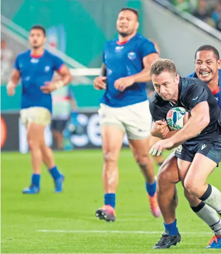  ?? Pictures: Getty Images/AP/PA. ?? Clockwise, from above: Greig Laidlaw escapes the clutches of Ed Fidow to score Scotland’s second try; Sean Maitland dives in for the opener after collecting Finn Russell’s crossfield kick; Jamie Ritchie burst through a Jack Lam tackle; Blade Thomson makes ground with a surging run.