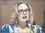  ?? MANDEL NGAN — POOL VIA AP ?? Sen. Kyrsten Sinema, D-Ariz., speakingin­g during a Senate Finance Committee hearing on Oct. 19 in Washington, D.C., is now comfortabl­e with accepting corporate donations.
