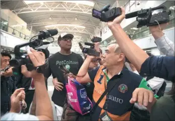  ?? MARK SCHIEFELBE­IN / ASSOCIATED PRESS ?? Dennis Rodman, former NBA player, arrives at Beijing Capital Internatio­nal Airport on Tuesday.