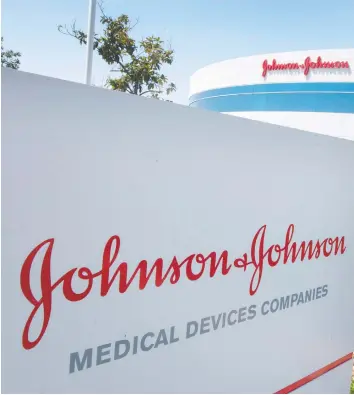  ?? MARK RALSTON/AFP/GETTY IMAGES ?? Some critics say Johnson & Johnson’s legal woes suggest it valued profit above all else. Analysts say the cost of resolving at least 100,000 more damage claims may reach US$20 billion. It has already been ordered to pay US$8 billion for pushing doctors to prescribe the antipsycho­tic drug Risperdal.