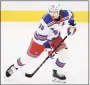  ?? Nick Wass / Associated Press ?? Rangers left wing Artemi Panarin warms up before Saturday’s game against the Capitals.