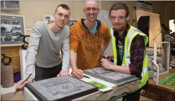  ??  ?? Stone Cutters at work at the Kerry ETB Open Day in Brandon Hotel,Tralee on Thursda.y Jim Lacey, Darren Enright and Andy O’Connor are prictured here with an example of their work.