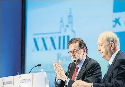  ?? XAVIER GÓMEZ / ARCHIVO ?? Mariano Rajoy y Juan José Brugera en las últimas jornadas del Círculo de Economía en Sitges