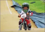  ?? MICHILEA PATTERSON — DIGITAL FIRST MEDIA ?? Jordan Didget, 4, uses a balance bike on the BMX track at Pottstown’s Trilogy Park as part of Olympic Day, an annual youth celebratio­n.