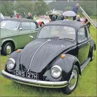  ??  ?? A Volkswagen Beetle was a family car for four in the 1970s.