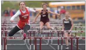  ?? (NWA Democrat-Gazette/J.T. Wampler) ?? Harding Academy’s Becca Dugger (left) competes in the 100-meter hurdles Tuesday at the Class 3A girls state track and field meet at Lincoln. Dugger helped lead the Lady Wildcats to the girls state championsh­ip.