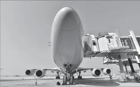  ?? LYU JIA / FOR CHINA DAILY ?? A Boeing aircraft docks at Chengdu Tianfu Internatio­nal Airport in Sichuan province in January.