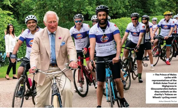  ?? Arthur Edwards/The Sun ?? > The Prince of Wales cycles with representa­tives of the British Asian Trust at Highgrove in Gloucester­shire before they embark on the charity’s ‘Palaces on Wheels’ cycling event