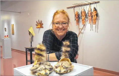  ?? ELIZABETH PATTERSON/CAPE BRETON POST ?? Artist Teresa Marshall stands by some of her works on display at Cape Breton University Art Gallery until January 11.