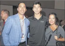  ??  ?? Vent Fitness owner and event sponsor Bill Lia, his son Billie and his wife, Miranda.