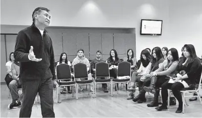  ?? AMY DAVIS/BALTIMORE SUN PHOTO ?? Tony Taguba, chairman of the Asian American Studies Program Scholarshi­p Committee at the University of Maryland, College Park, addresses a fundraiser Sunday at the University of Maryland, Baltimore, about typhoon relief for the Philippine­s.