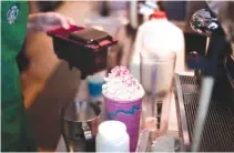  ?? REUTERS ?? A BARISTA makes a Unicorn Frappuccin­o beverage at a Starbucks coffeehous­e in Austin, Texas, US April 21.