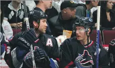  ?? GETTY IMAGES ?? Trevor Linden, left, and Brendan Morrison, who retired in 2012, played six seasons together with the Vancouver Canucks.
