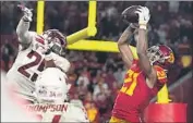  ?? Wally Skalij Los Angeles Times ?? USC’S Tyler Vaughns catches a two-point conversion in the victory over Washington State last week.