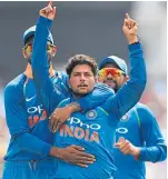  ?? Getty. ?? Kuldeep Yadav takes the wicket of England’s Joe Root.