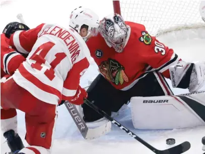  ?? NAM Y. HUH/AP ?? Hawks goalie Cam Ward stopped 43 of the 45 shots he faced Sunday against the Red Wings at the United Center.