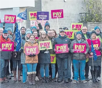  ?? ?? STRIKING AHEAD: The picket line at Grove Academy on the strike day last month.