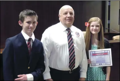  ?? Photo courtesy of Springvill­e City ?? Students Jaden Christense­n and Korri Cooper were presented with the Springvill­e Mayor’s Recognitio­n Award during a January city council meeting. They are pictured with Springvill­e City Councilman Chris Sorensen.