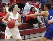  ?? MIKE BUSH/NEWSSENTIN­EL ?? Lodi guard Reese Hohenthane­r looks to pass the basketball past Bear Creek forward Cassidy Bryne in Monday's Sac-Joaquin Section's Foundation Game at The Inferno.