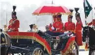  ?? AP ?? ■ President Hussain arrives in a traditiona­l horse-driven carriage to attend the military parade in Islamabad, yesterday.