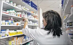  ?? JACQUES BOISSINOT /THE CANADIAN PRESS ?? Studies show that a national universal plan would save at least $11 billion per year of the approximat­ely $29 billion that Canadians spend yearly for medical drugs.