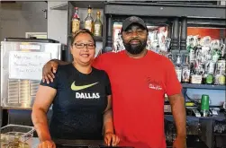  ?? ARIANA GARCIA ?? Damara Guillory and her brother Dawan Anderson own Bahadi’s Chicken in Pflugervil­le. The restaurant name originates from Anderson’s middle name. He said it means “good luck.”