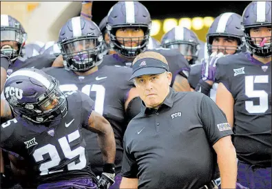  ?? AP/Fort Worth Star-Telegram/RODGER MALLISON ?? TCU Coach Gary Patterson prepares to lead his team onto the field before Saturday’s 63-0 victory over Jackson State. Last year, the Horned Frogs suffered their third losing season in 16 years under Patterson.