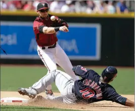  ?? ASSOCIATED PRESS ?? ARIZONA DIAMONDBAC­KS SHORTSTOP CHRIS OWINGS gets the force out on Cleveland Indians Edwin Encarnacio­n (10) in the fourth inning during Sunday’s game in Phoenix.