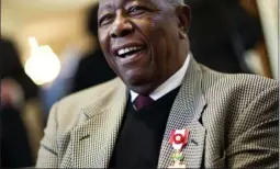  ?? DAVID GOLDMAN ?? Hank Aaron smiles after being presented with the Order of the Rising Sun, Gold Rays with Rosette by the Consul General of Japan at his official residence Thursday, Jan. 14, 2016, in Atlanta.